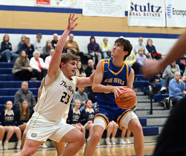 Tigers help out their coach with opening-night win
